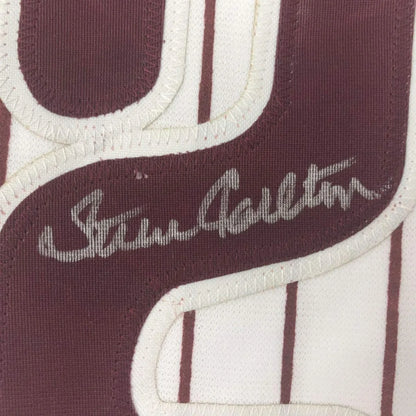 Maroon and white Carlton autographed baseball jersey framed and ready to hang