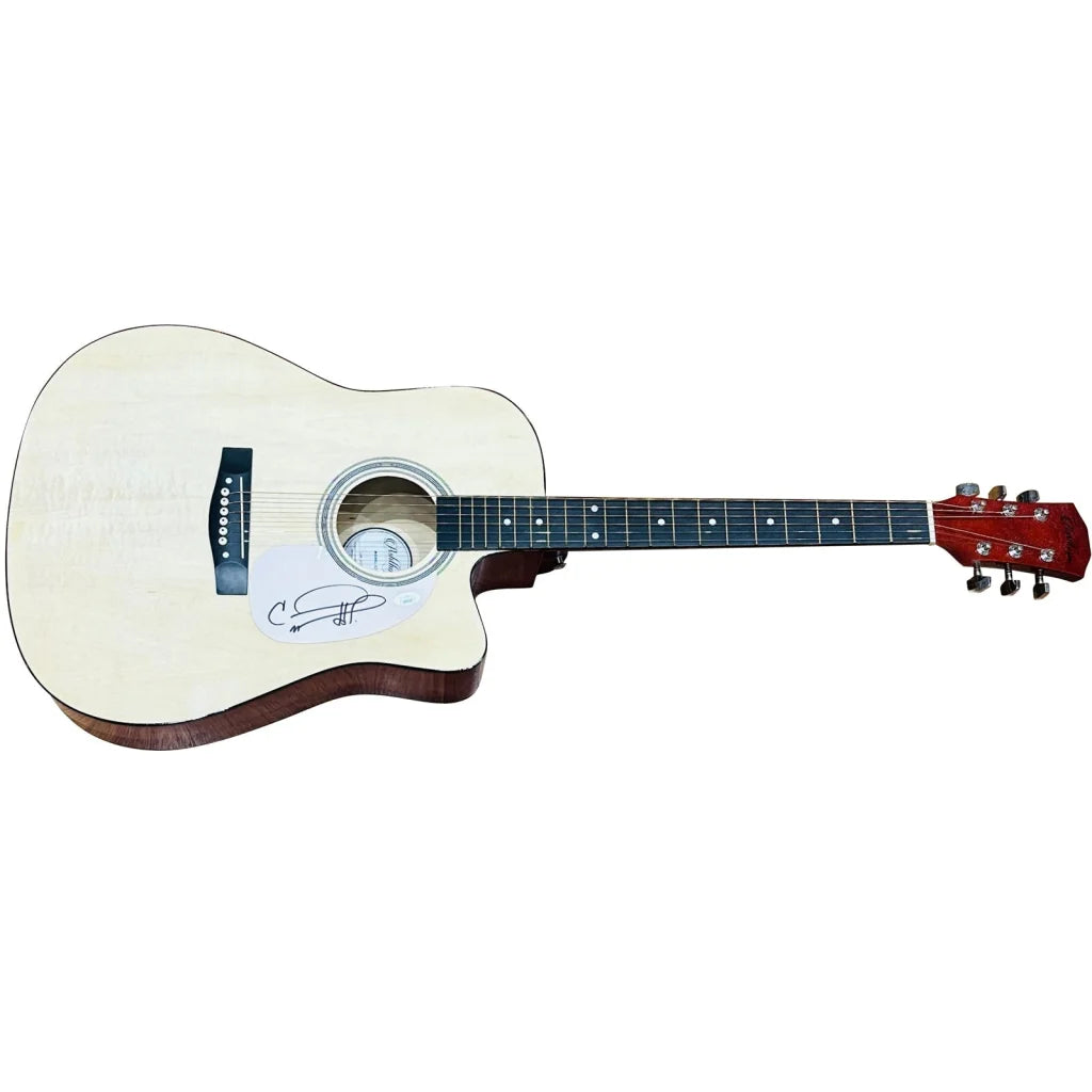 Carrie Underwood natural acoustic guitar with red headstock autograph