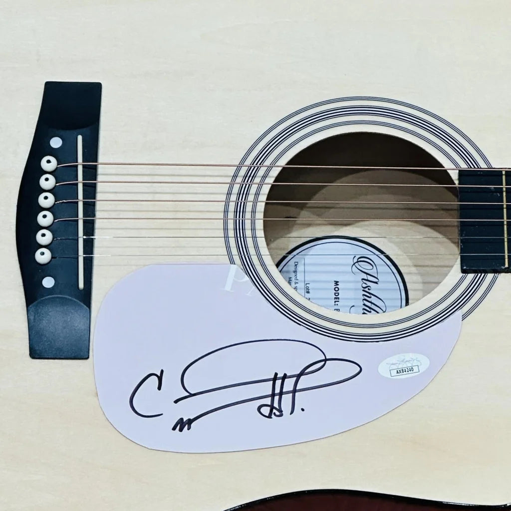 Carrie Underwood natural acoustic guitar with autograph and pick