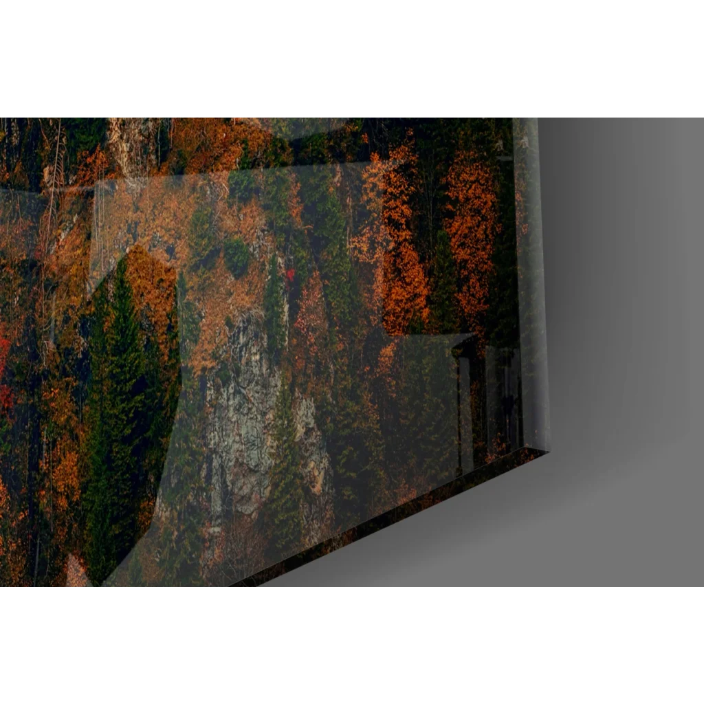 Vibrant autumn glow glass wall art of Neuschwanstein Castle forest scene