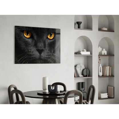 Striking black cat glass wall art with vivid golden eyes close-up