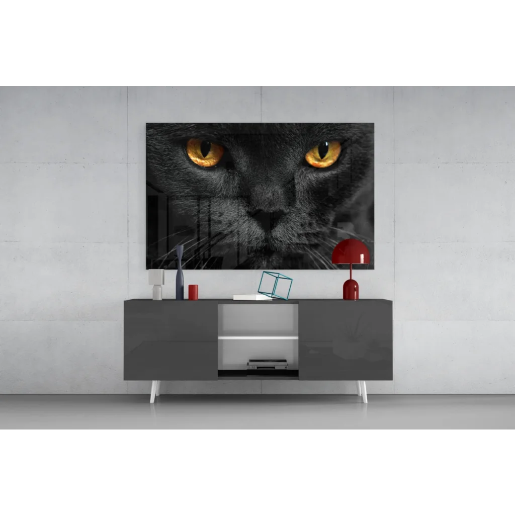 Mesmerizing black cat glass wall art with piercing golden eyes