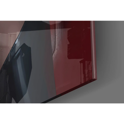 Sleek abstract glass wall art with bold geometric shapes in red and gray