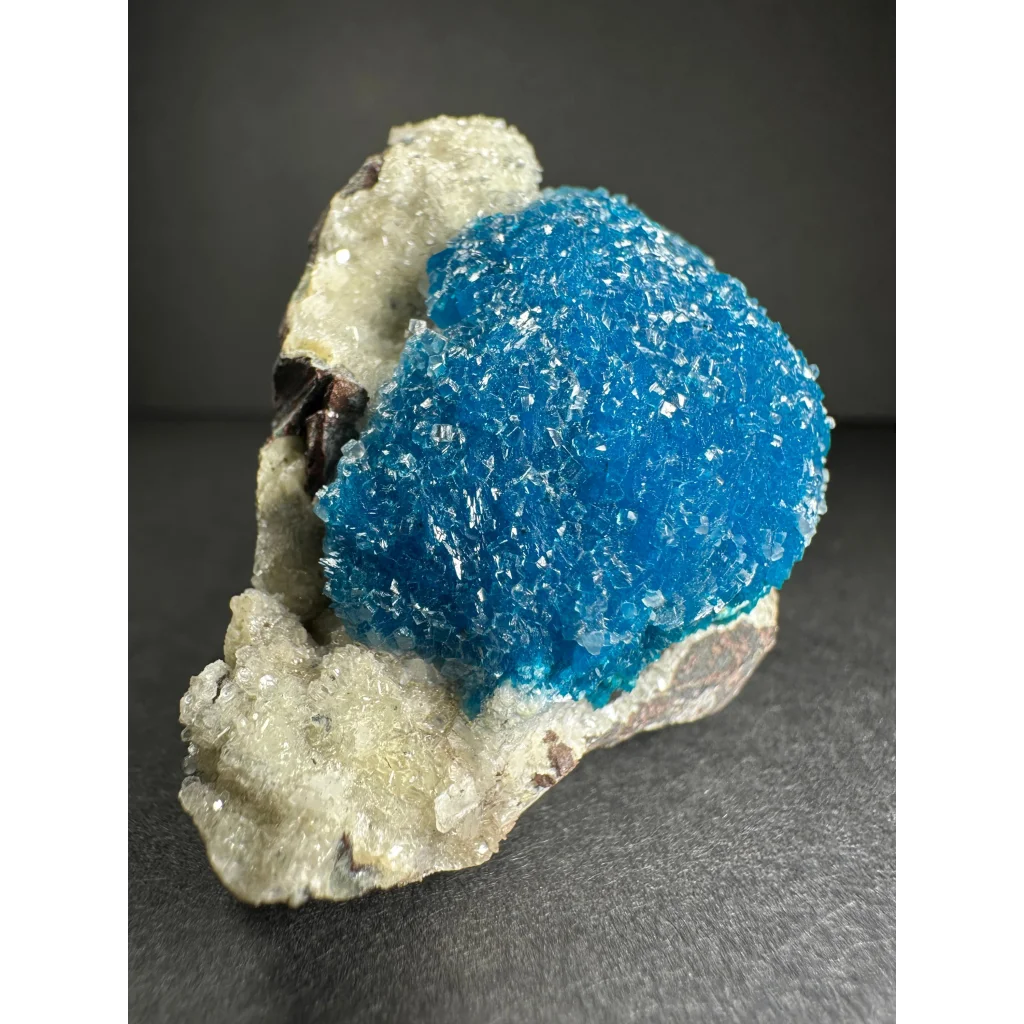 Vibrant blue cavansite with stilbite crystals on matrix from Pune, India