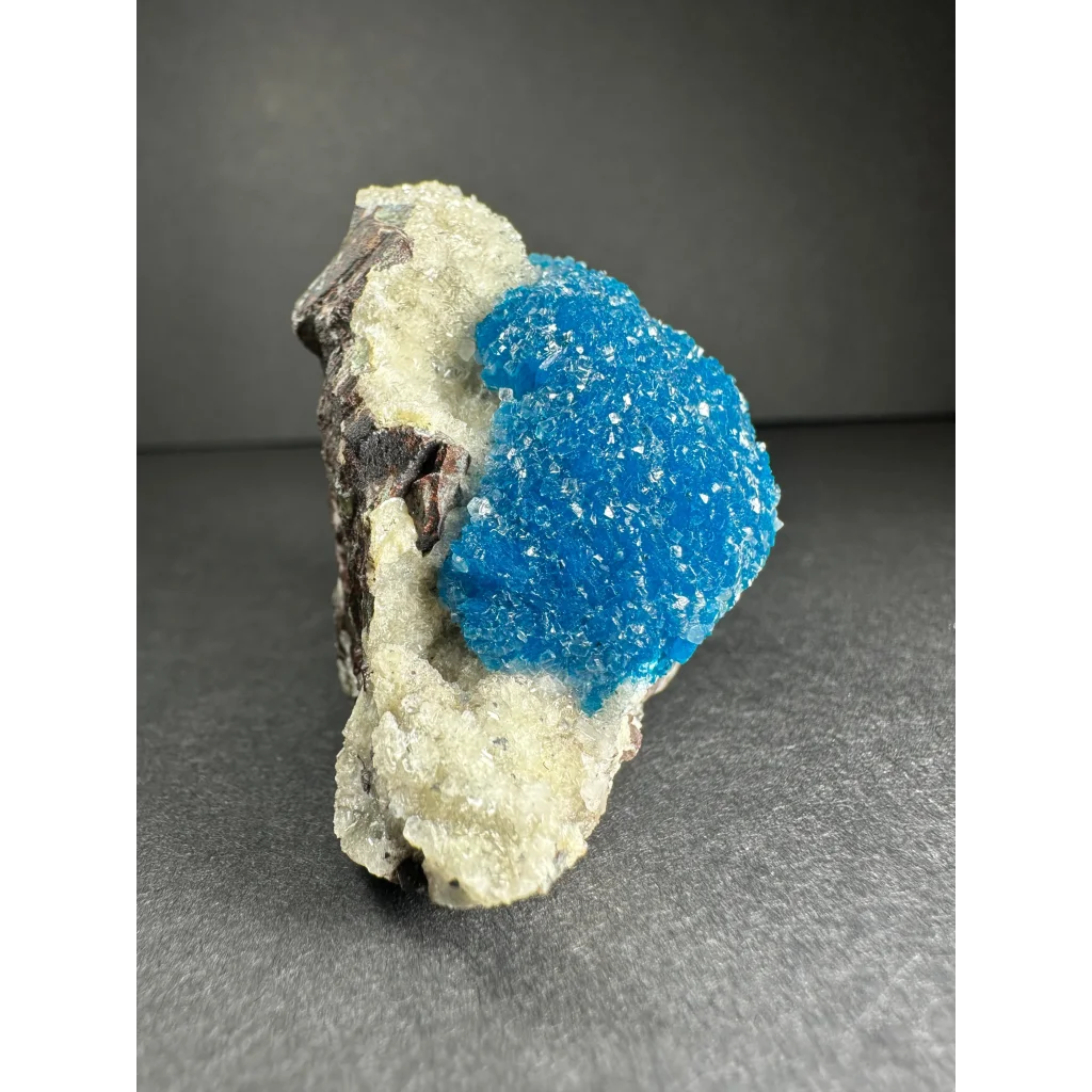 Vibrant blue cavansite with stilbite crystals on matrix from Pune, India