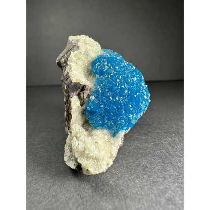 Vibrant blue cavansite with stilbite crystals on matrix from Pune, India