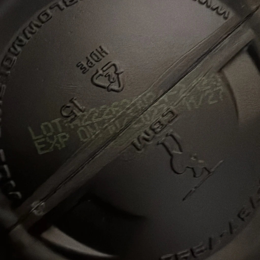 Back of CG5 Creatine + Glutamine tub with dark gray engraved lot 15 exp recycling logo