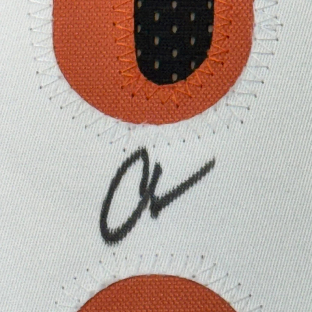 White fabric with orange and black stitched design on Chad Johnson Bengals jersey