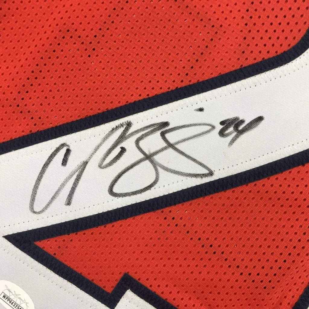 Orange Denver Broncos jersey signed by Champ Bailey ready to hang on your wall