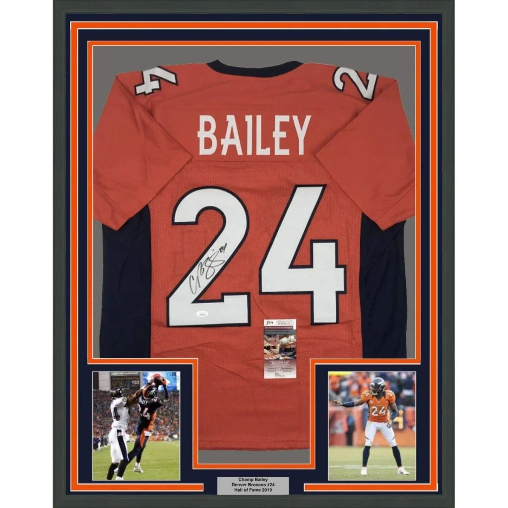 Framed signed Denver Broncos Bailey #24 football jersey with photos for wall display