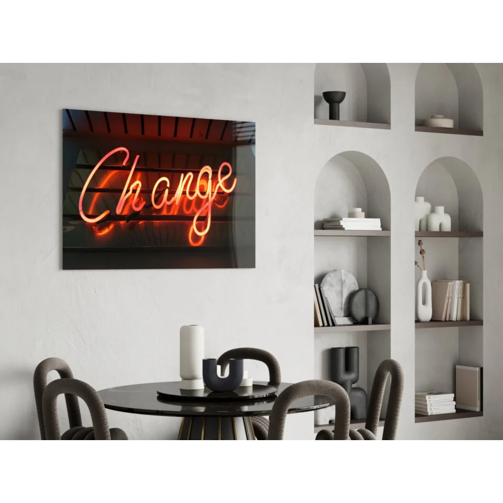 Glowing orange neon Change sign on white wall, pink glass wall art decor