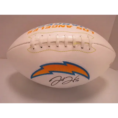 White commemorative football with blue and orange accents, Chargers signed autographed logo football