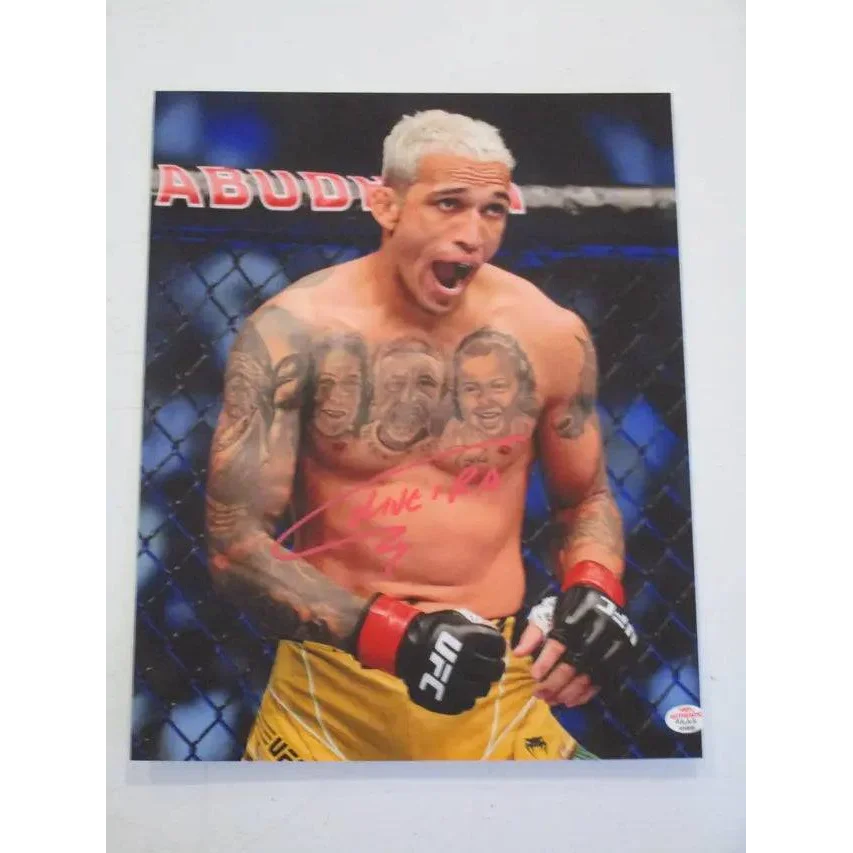 Autographed Charles Oliveria signed 8x10 photo with PAAS COA showcasing UFC fighter tattoos
