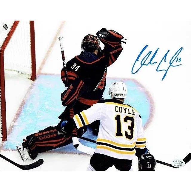 Autographed Boston Bruins photo of Charlie Coyle and teammate on the ice
