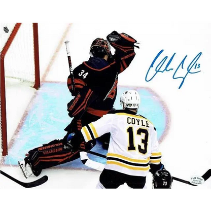 Autographed Boston Bruins photo of Charlie Coyle and teammate on the ice