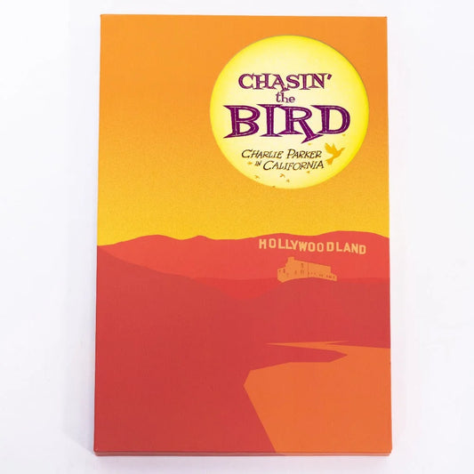 Charlie Parker’s Deluxe Edition yellow red notebook with sun design
