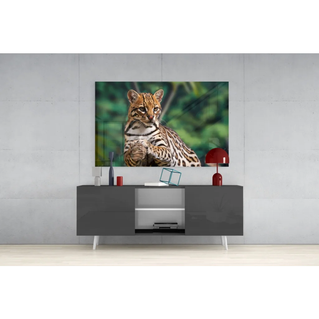 Close-up ocelot wall art with piercing golden eyes and spotted fur