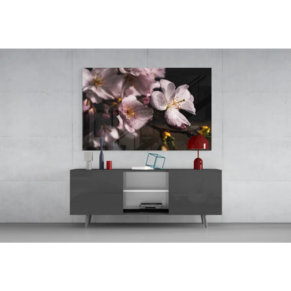 Framed pink cherry blossom dewdrop wall art on gray console