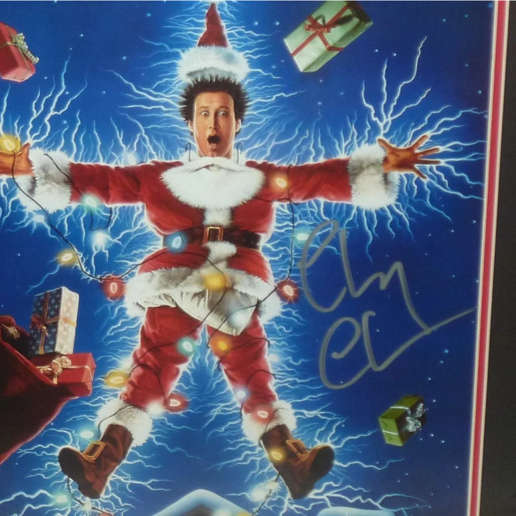 Chevy Chase autographed Christmas Vacation deluxe framed poster with Santa costume