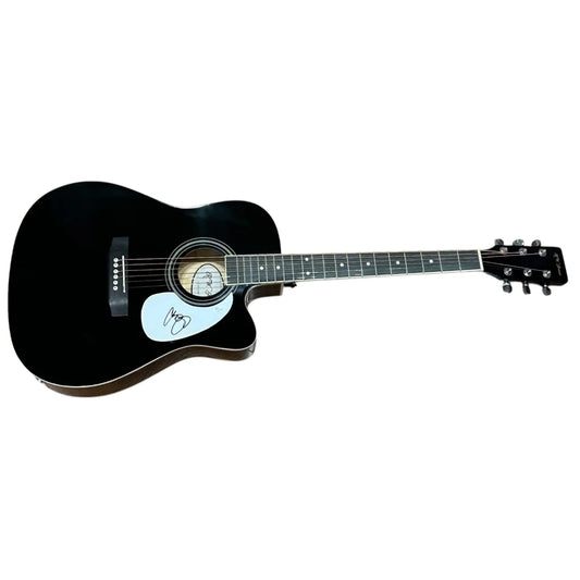 Chris Young autographed black acoustic guitar with white pickguard