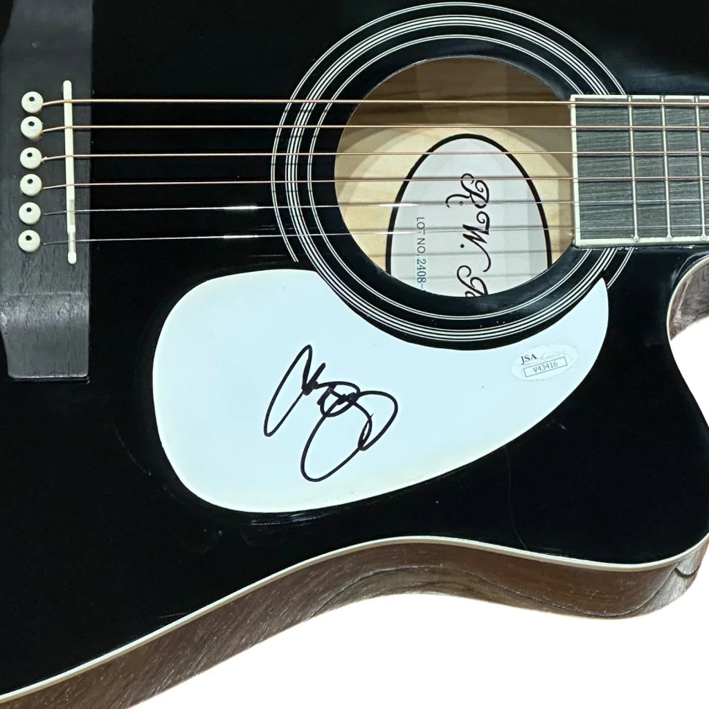 Chris Young autographed black acoustic guitar with JSA sticker