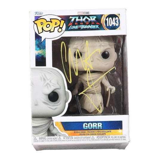 Christian Bale signed Funko Pop Gorr figure from Thor Love and Thunder on display