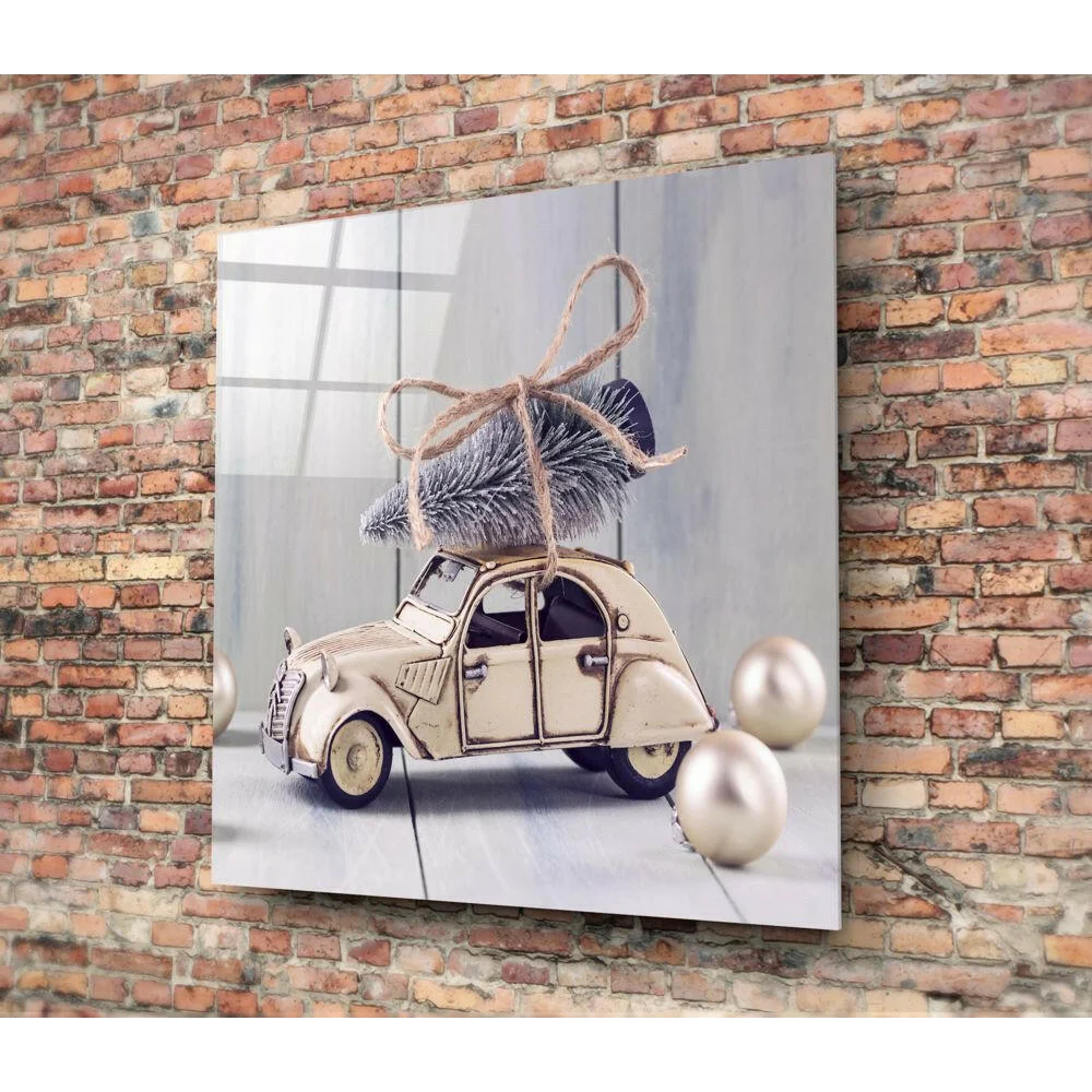 Vintage Citroën glass wall art with toy car and Christmas tree on brick