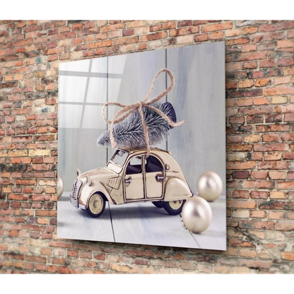 Vintage Citroën glass wall art with toy car and Christmas tree on brick