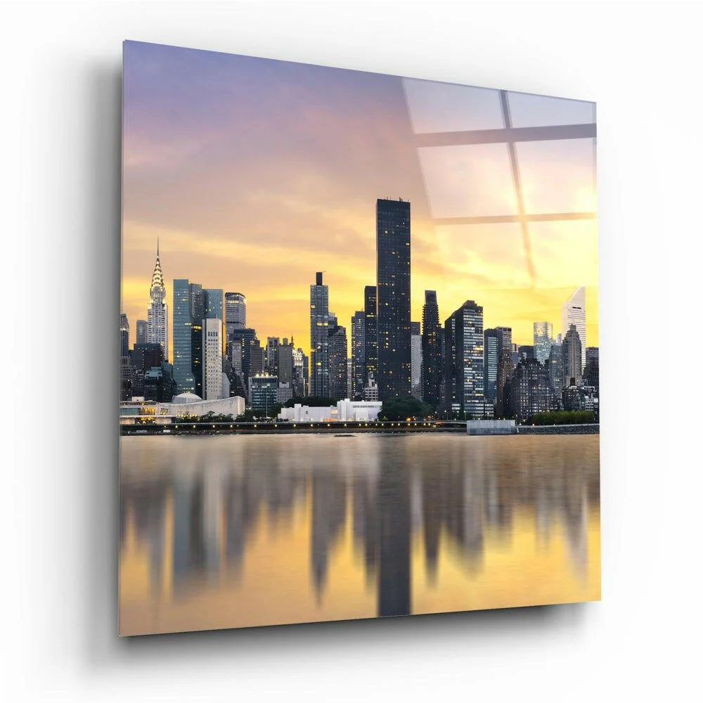 Vibrant sunset skyline glass wall art with golden reflections