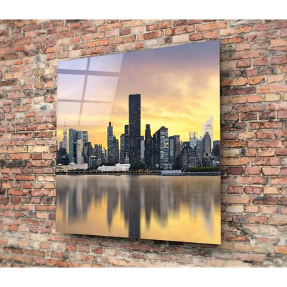 Vibrant sunset skyline glass wall art with golden reflections