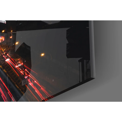 Sleek black framed glass wall art of nighttime cityscape with red light trails