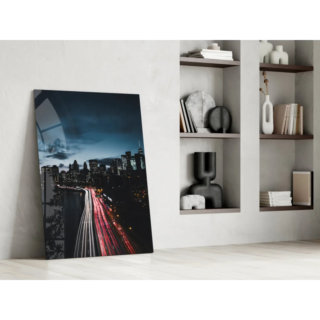 Sleek glass wall art of black-and-white cityscape with red light trails