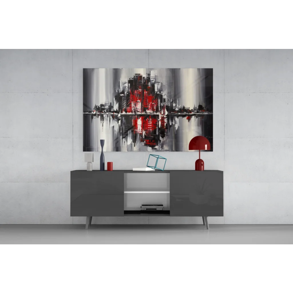Abstract glass wall art of cityscape in red, black, gray brushstrokes on water