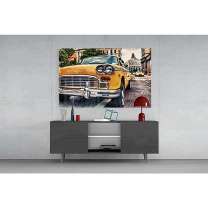 Vibrant yellow vintage taxi cab wall art print on gray console
