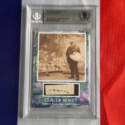 Beckett-graded claude monet authentic handwriting trading card featuring monet holding a palette with water lily backdrop