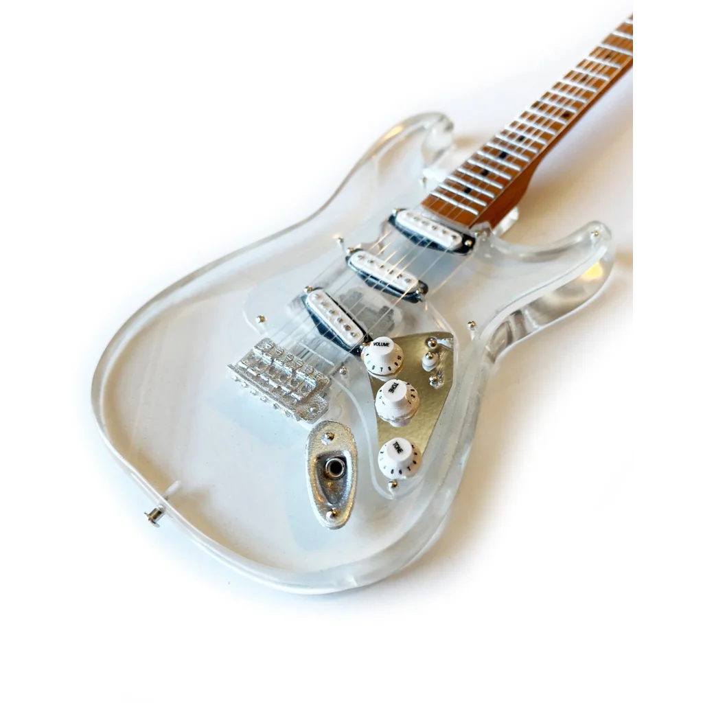 Clear Axe Heaven mini guitar with acrylic body, chrome hardware, maple neck on adjustable A-frame stand
