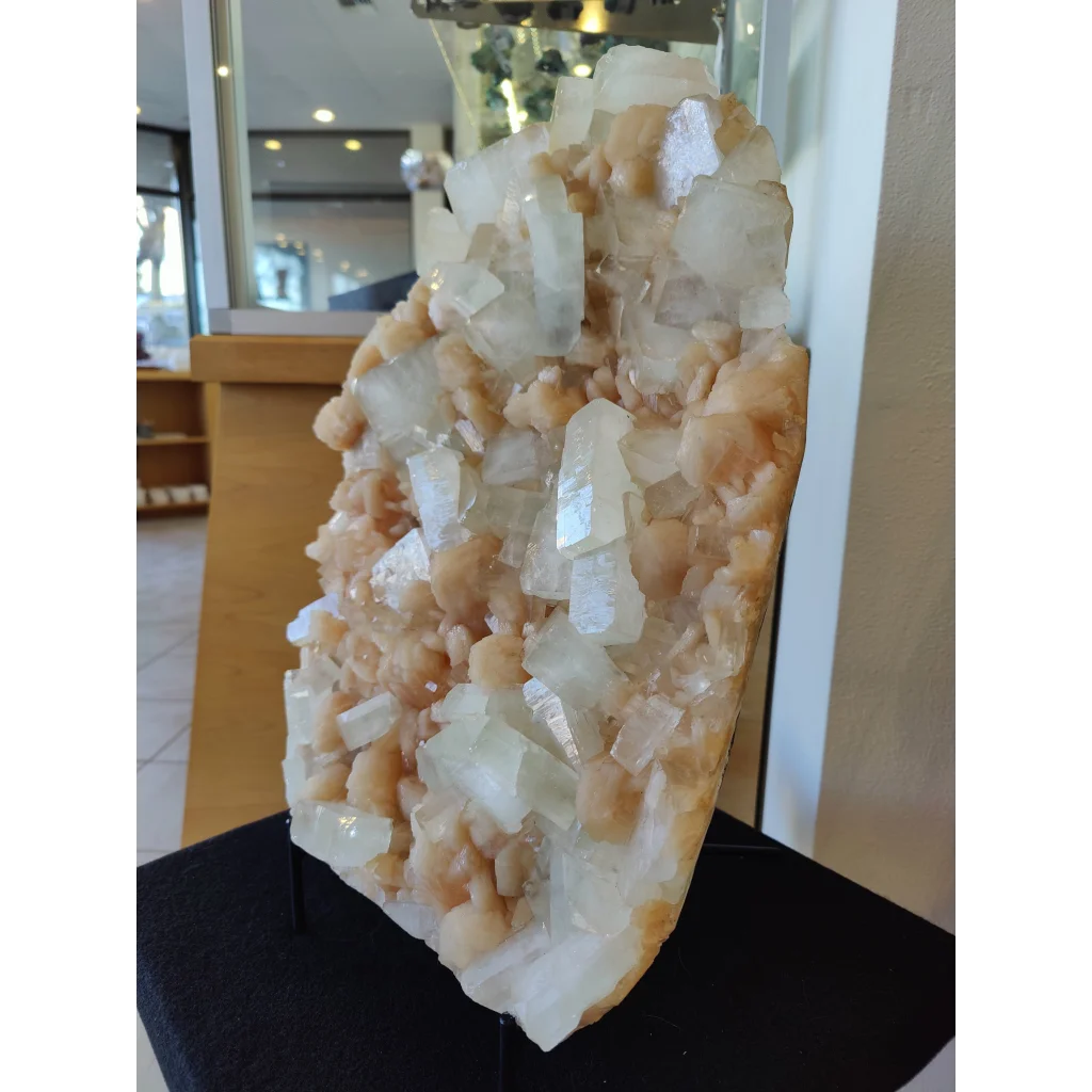 Clear apophyllite cubes with peach stilbite crystal cluster specimen