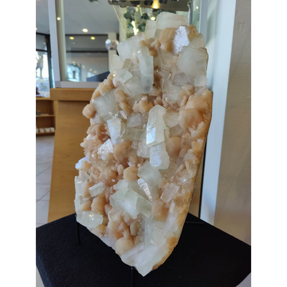 Clear apophyllite cubes with peach stilbite crystal cluster specimen