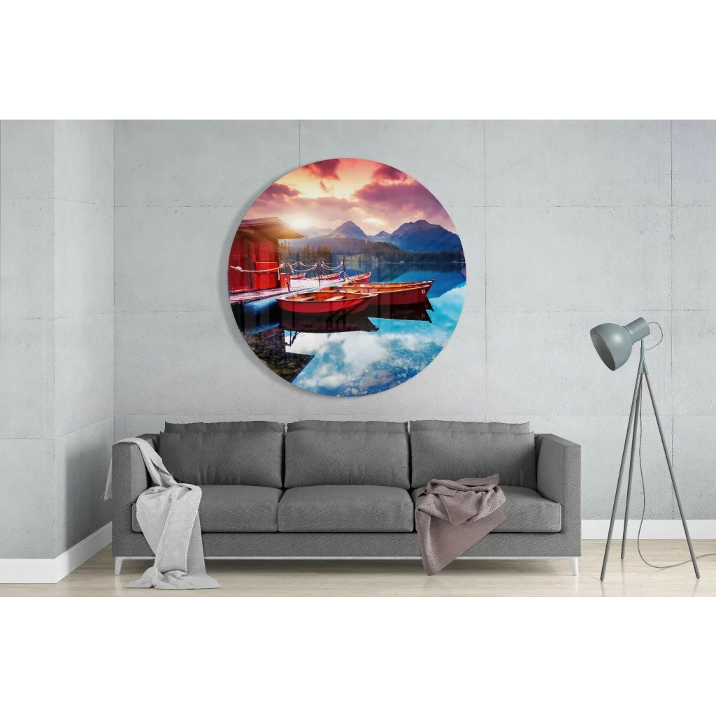 Vibrant sunset over red boats in tempered glass art on calm lake