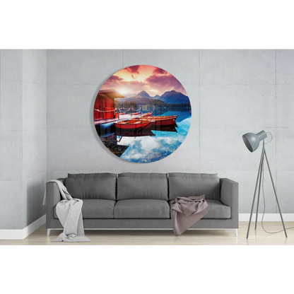 Vibrant sunset over red boats in tempered glass art on calm lake