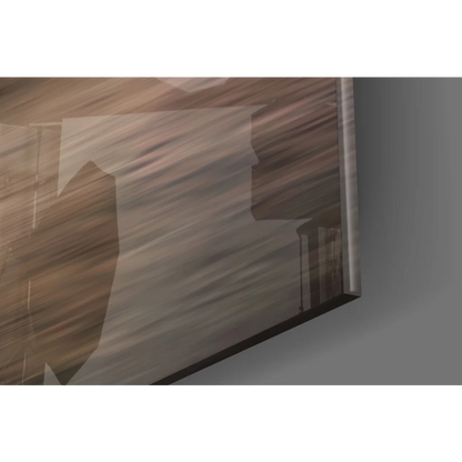 Fiery coastal sunset glass wall art over rugged rocks in brown tones