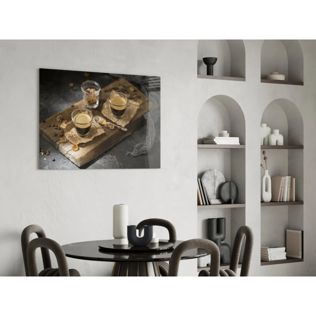 Black and white glass wall art of two espresso glasses on rustic wood