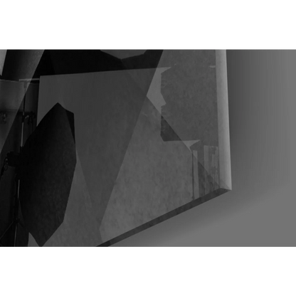 Sharp black geometric glass wall art with angular triangular facets