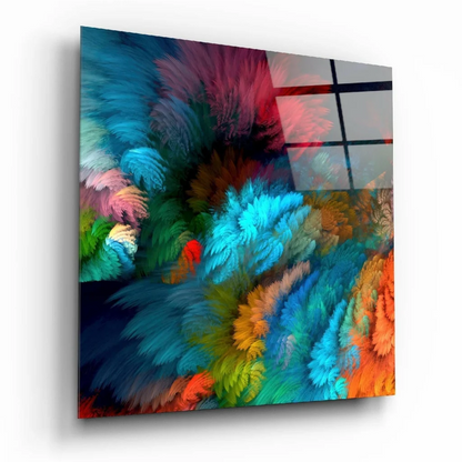 Vibrant swirling feather glass wall art in electric blues and fiery oranges
