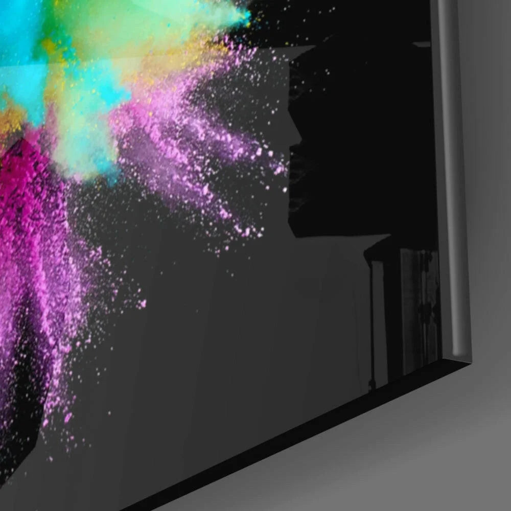 Vibrant multicolored powder explosion glass wall art on black panel