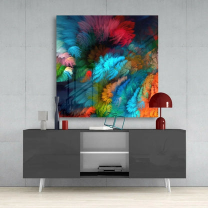 Vibrant swirling feather glass wall art in teal, magenta, orange, and green hues