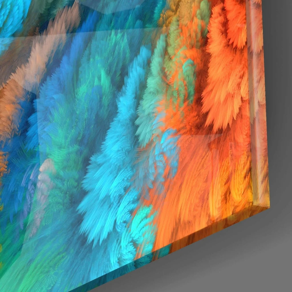 Vibrant swirling feather glass wall art in electric blues and fiery oranges