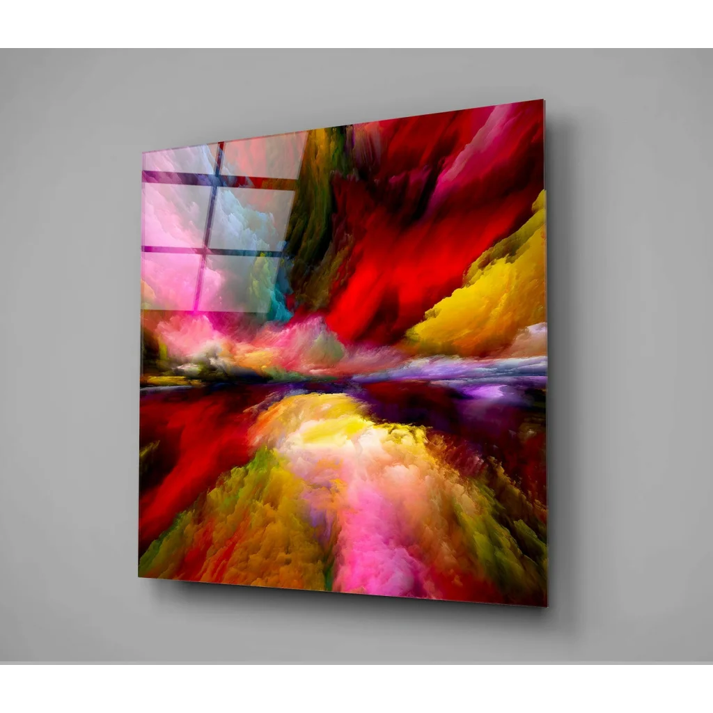 Vibrant glass wall art with bold swirling reds, yellows, and pinks