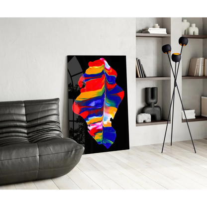 Vibrant glass wall art with flowing abstract stripes in red, orange, yellow, blue, pink on black