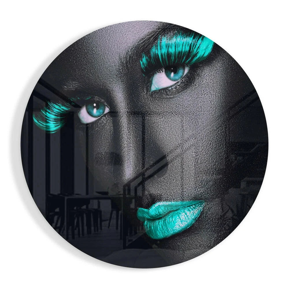 Stunning teal portrait tempered glass art circle with black skin, glittery teal lashes, lips, and striking blue colored eyes
